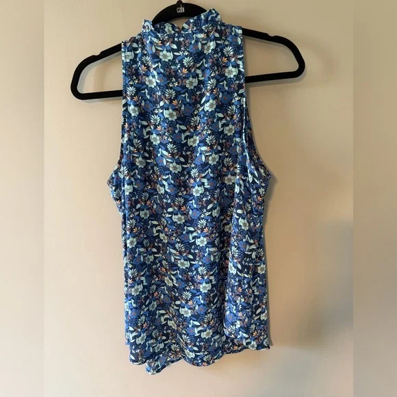 Cabi Blue Floral Sleeveless Top. Button front with small ruffle collar & edge. - Picture 9 of 9